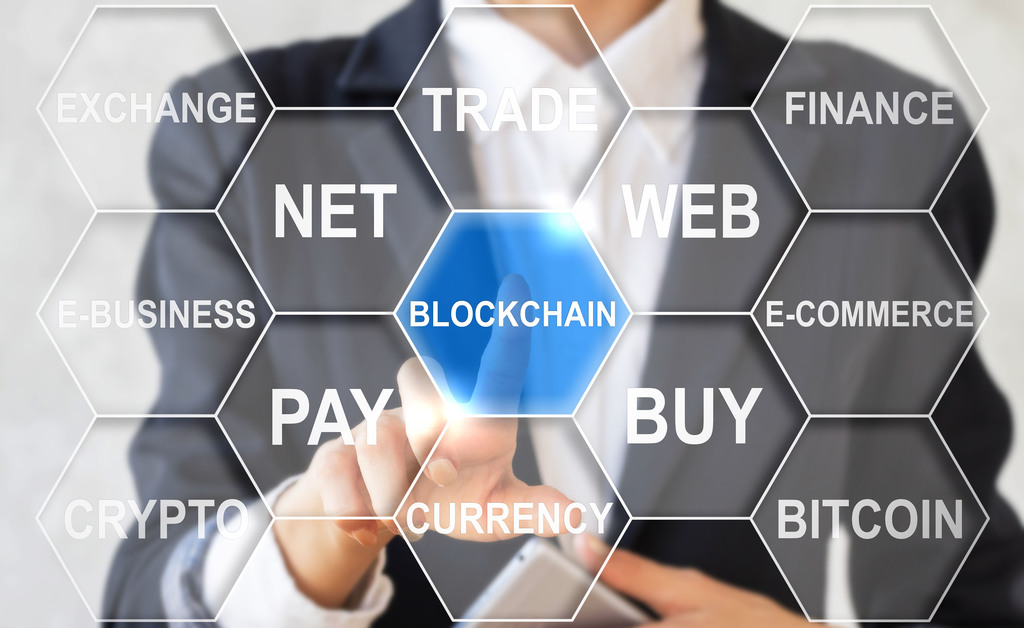 blockchain-hexagons-businesswoman-shutterstock.jpg